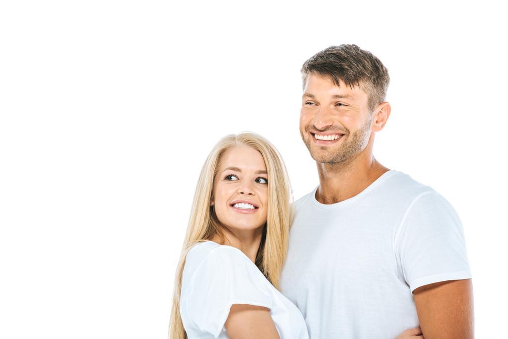 homme et femme heureux en t-shirts blancs souriant isolé sur blanc
  - Photo, image