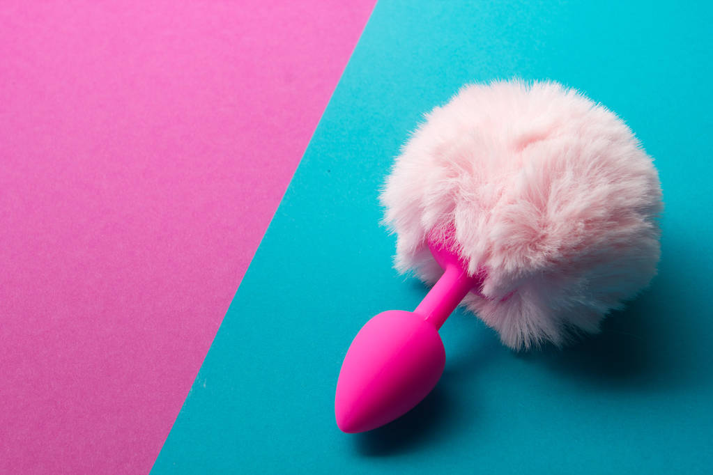 Sexspielzeug für Erwachsene auf rosa Hintergrund. - Foto, Bild
