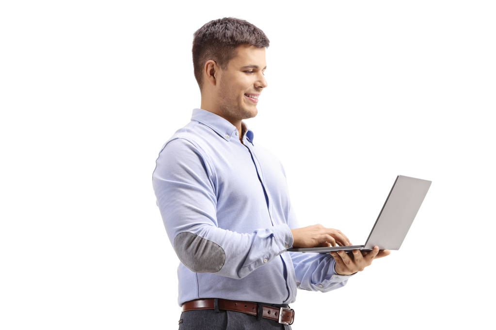Az ember a formális ruhák kezében egy laptop számítógép - Fotó, kép