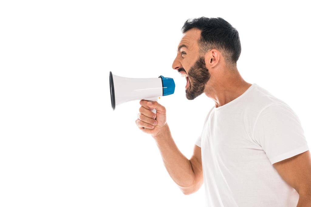 side view of angry man screaming in megaphone isolated on white  - 写真・画像