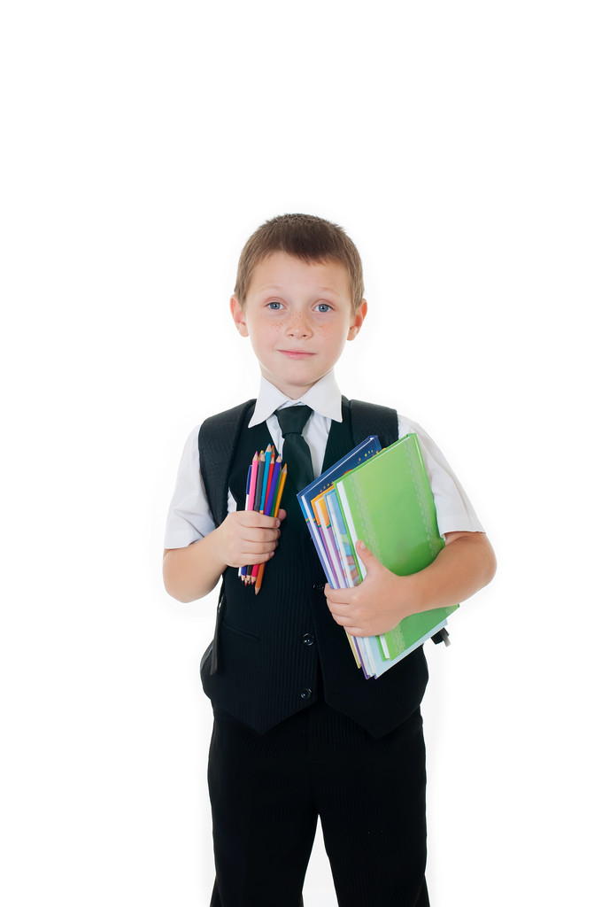 Menino com mochila escolar e livros sobre fundo branco
 - Foto, Imagem