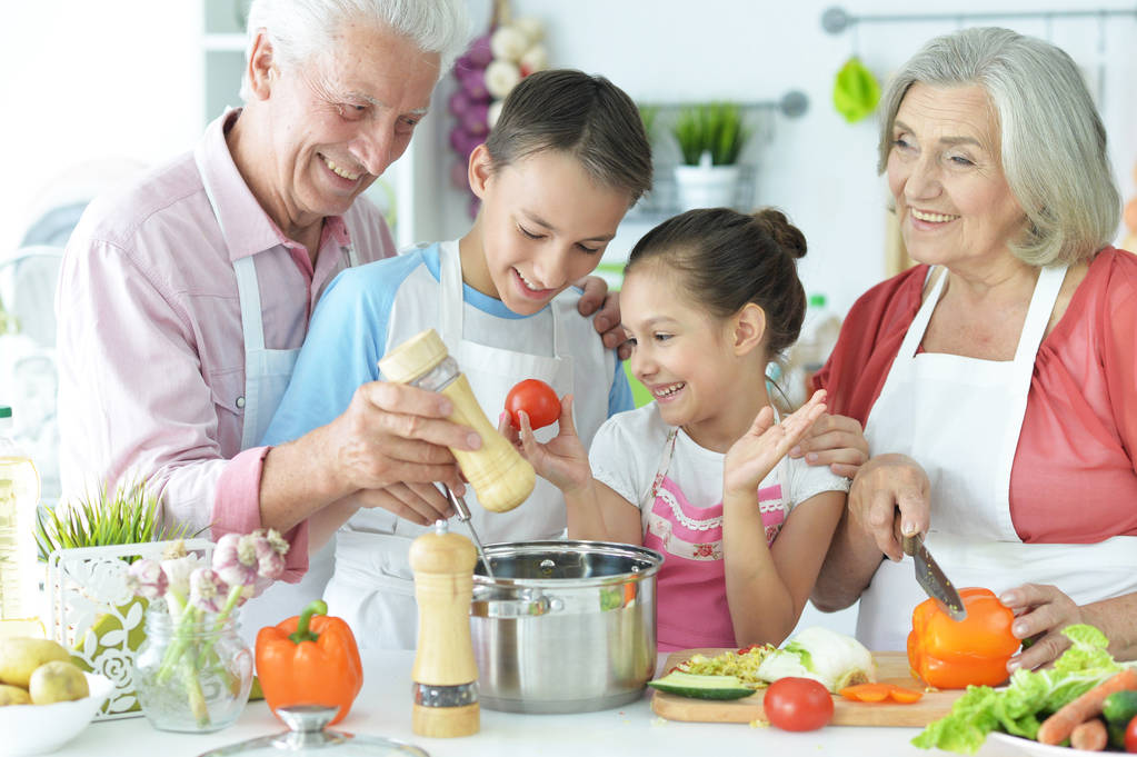 family cooking together in kitchen - Photo, Image