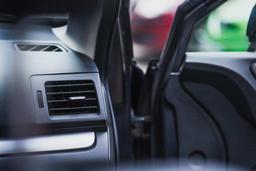 selective focus of car interior with open front door - Photo, Image