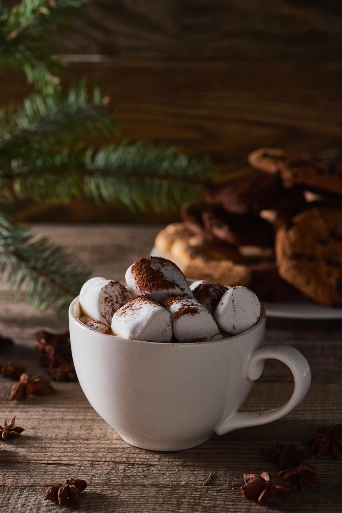 selective focus of Christmas cacao with marshmallow on wooden table - Photo, Image