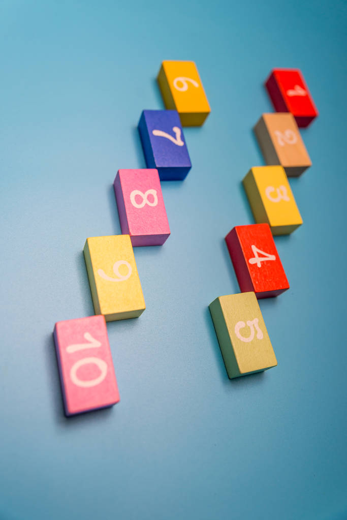 colored cubes with numbers on a blue background - Photo, Image