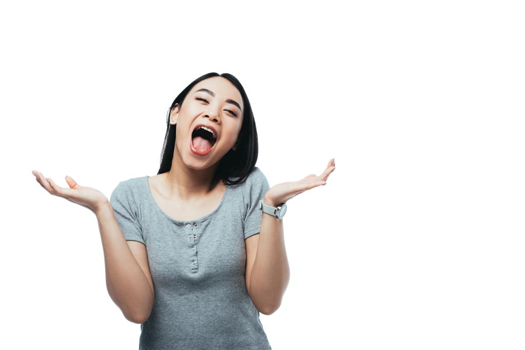 ενθουσιασμένοι ελκυστική ασιατική κοπέλα με ανοιχτό στόμα απομονώνονται σε λευκό - Φωτογραφία, εικόνα