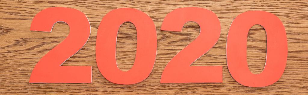 vista superior de los números de papel 2020 sobre fondo de madera, plano panorámico
 - Foto, Imagen