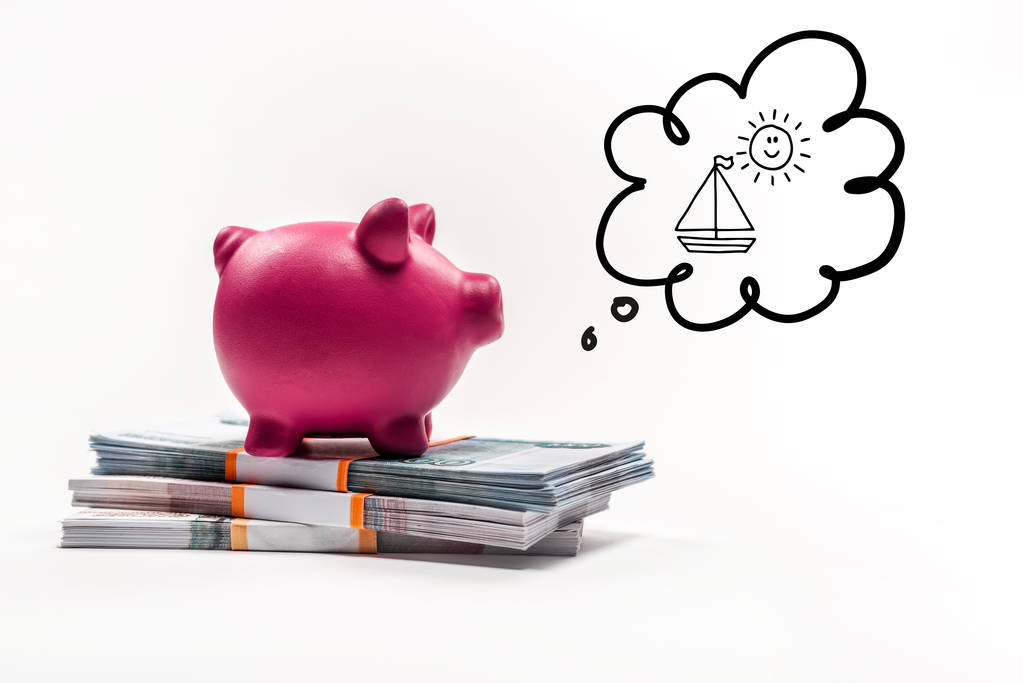 pink piggy bank on stack of russian rubles on white background with house in thought bubble illustration - Photo, Image