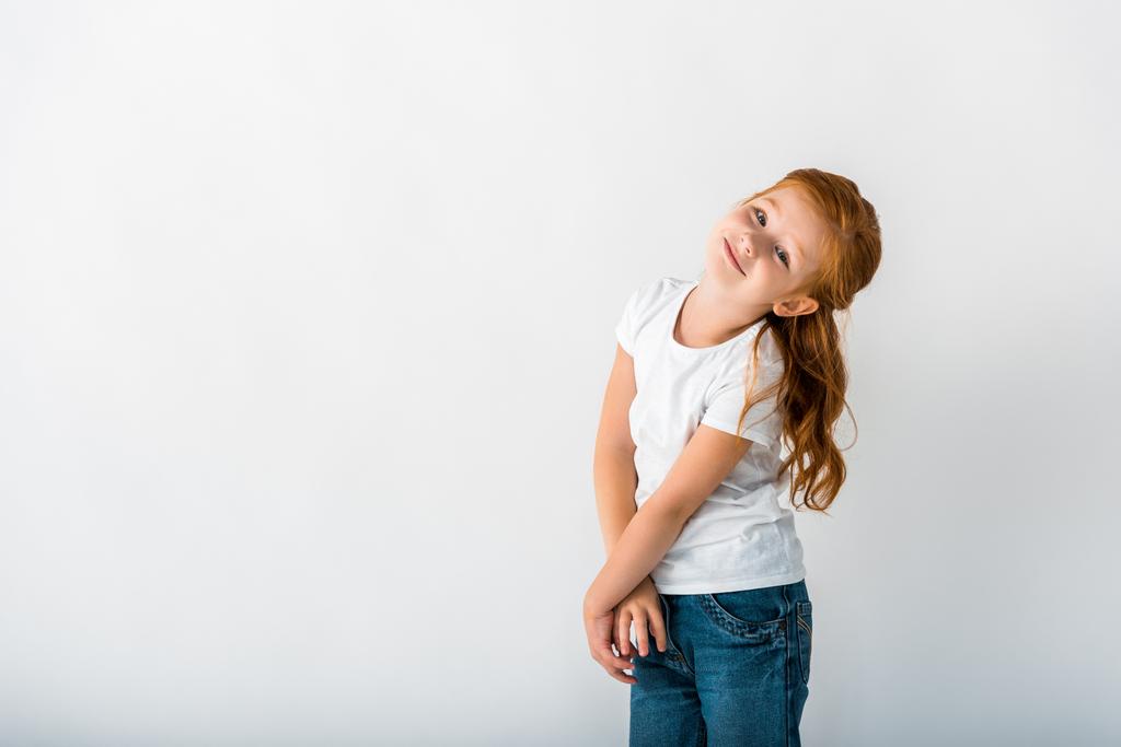 heureux rousse enfant regardant caméra sur blanc
  - Photo, image