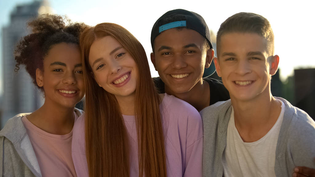 Happy multi-racial friends smiling camera, teenage unity, cheerful millennial - Photo, Image