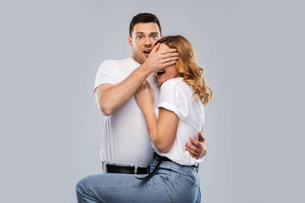 scared couple in white t-shirts - Photo, Image