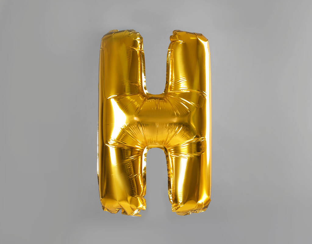 Gri arkaplanda altın harfli H balonu - Fotoğraf, Görsel
