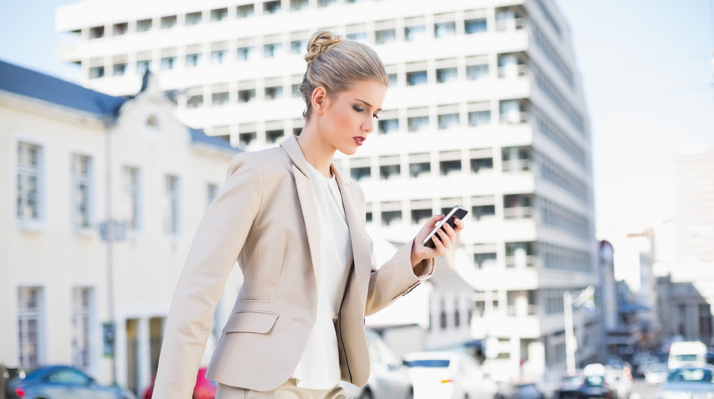 Focused gorgeous businesswoman text messaging - Photo, Image