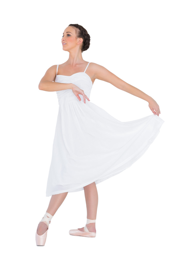 Jeune danseuse de ballet concentrée posant
 - Photo, image