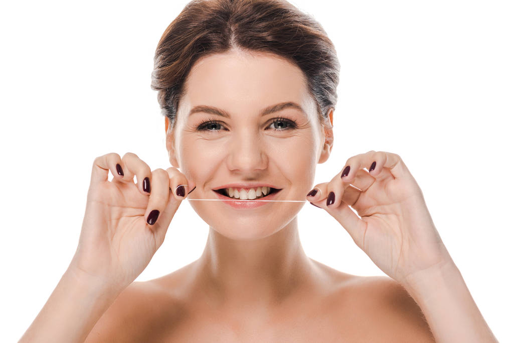 alegre mujer desnuda dientes de hilo dental aislados en blanco
  - Foto, imagen