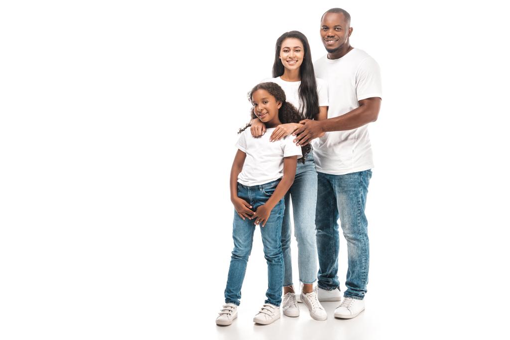 happy african american husband, wife and daughter looking at camera while standing on white background - Photo, Image