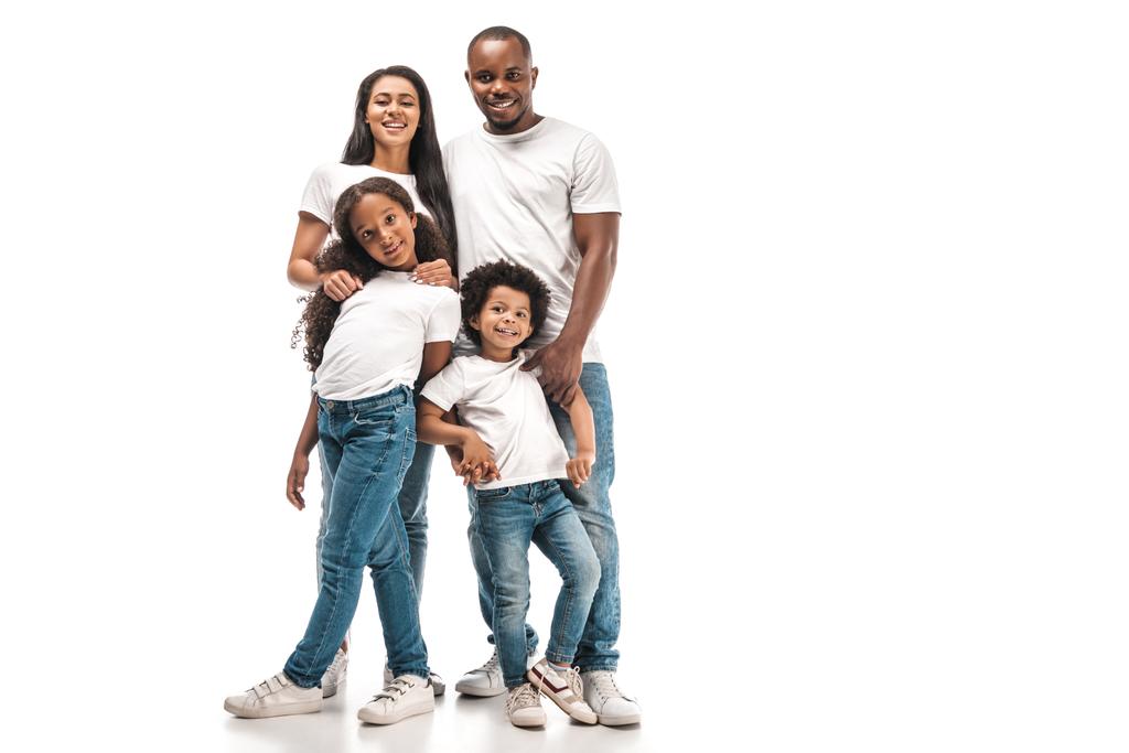happy african american parents with daughter and son smiling at camera while standing on white background - Zdjęcie, obraz