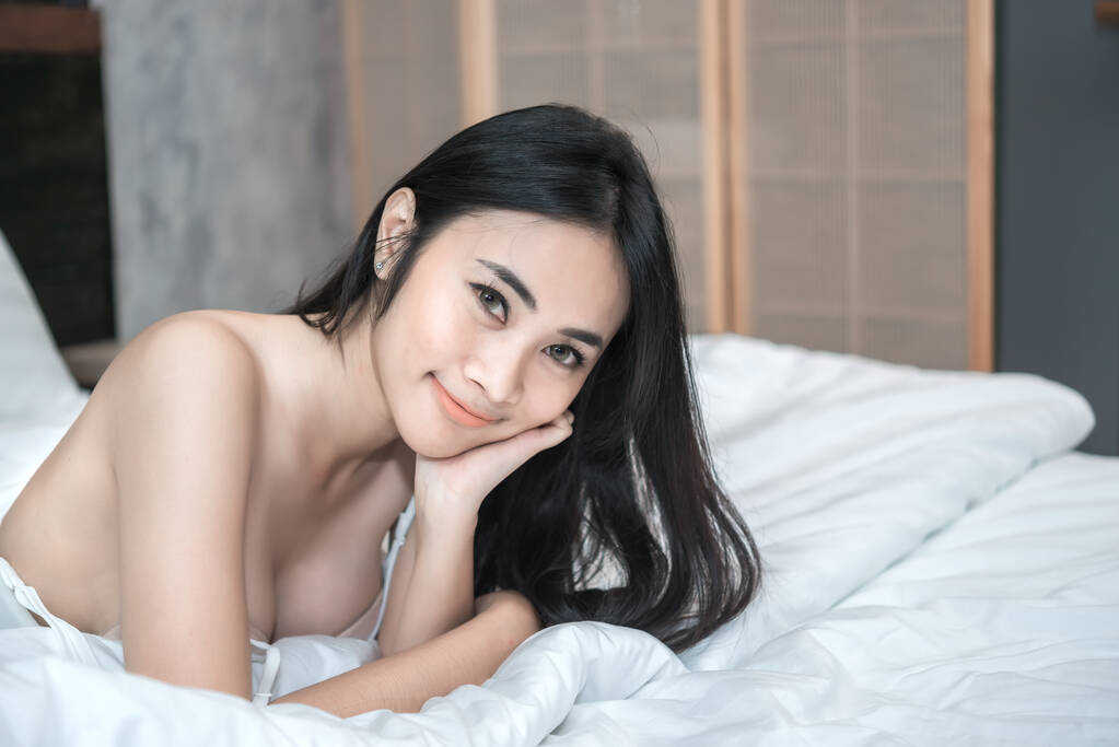 Portrait of Asian sexy woman on the bed - Photo, Image