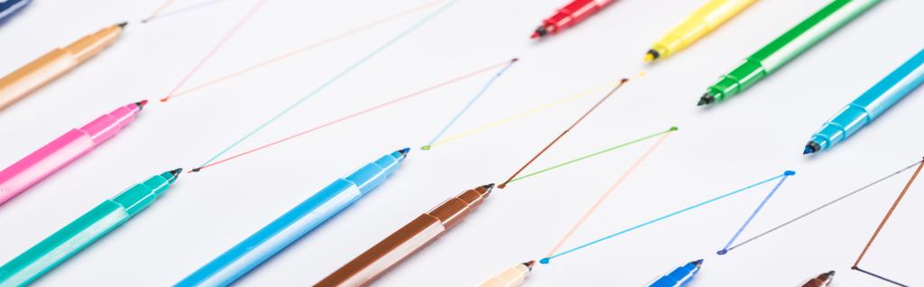 panoramic shot of colorful felt-tip pens on white background with connected drawn lines, connection and communication concept - Photo, Image