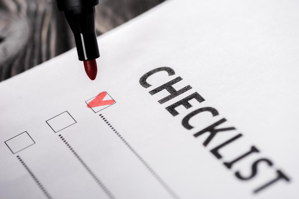 close up of checklist near red marker pen  - Fotografie, Obrázek