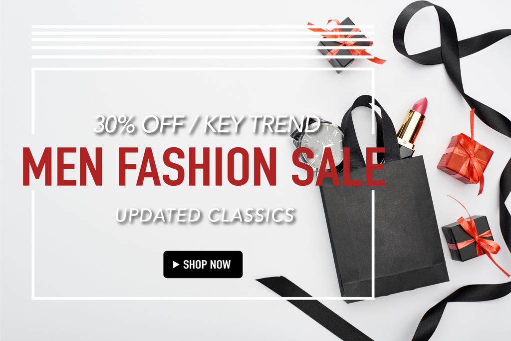 top view of small shopping bag with male wristwatch and female lipstick near ribbon and presents on white background with 30 percent off men fashion sale illustration  - Photo, Image