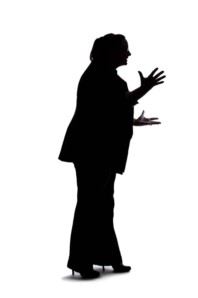 Silhouette of a curvy or plus size businesswoman on a white background for composites.  She is posed like she is angry - Photo, Image