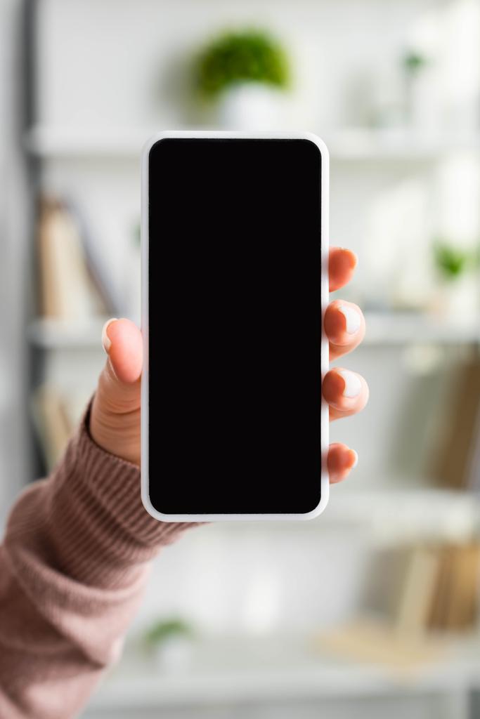 cropped view of woman holding smartphone with blank screen - Photo, Image