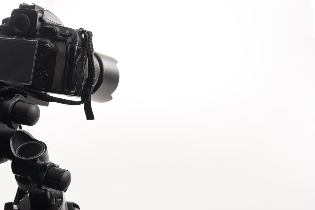black professional digital camera isolated on white - 写真・画像