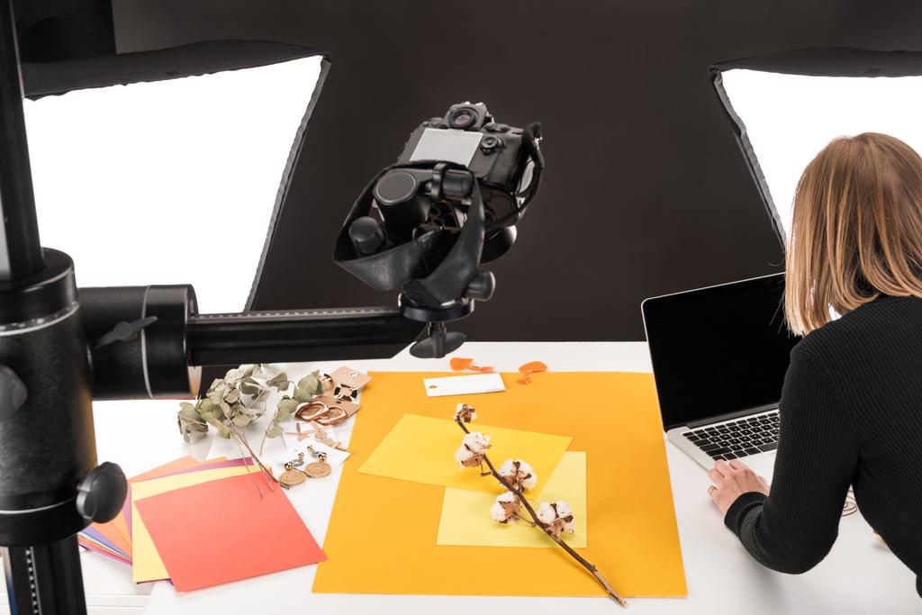 photographer making composition with cotton flower and accessories for photo shooting - 写真・画像