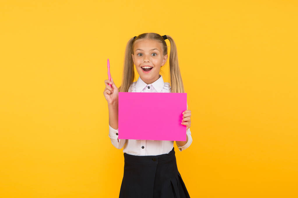 Creative idea. School girl show poster. Presentation poster copy space. Child presenting own project. Explain main point. Girl school uniform hold poster. Visual communication concept. School report - Photo, Image