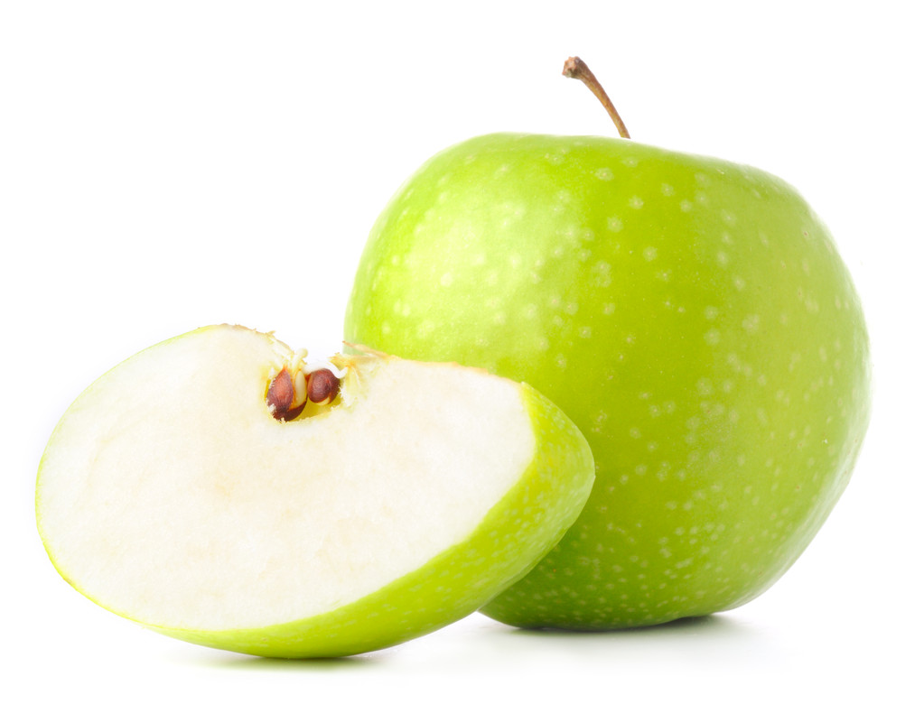 manzana verde y es rebanada aislada en blanco
 - Foto, imagen