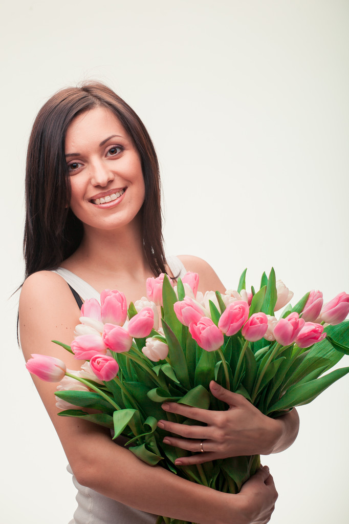 Ritratto di donna bruna con tulipani
 - Foto, immagini