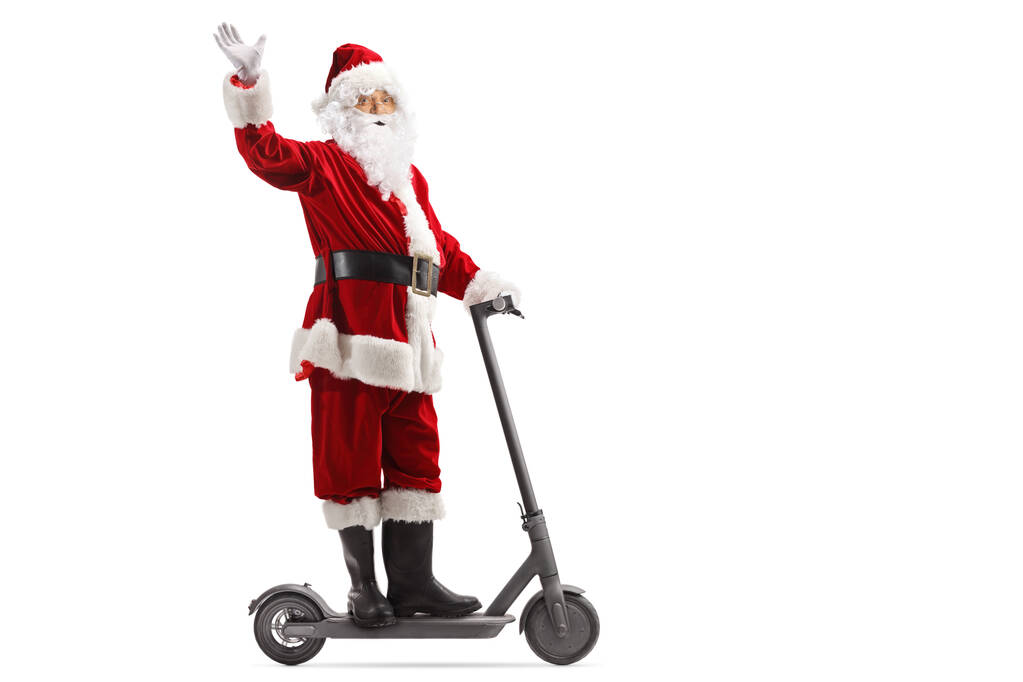 Święty Mikołaj machający ze skutera elektrycznego  - Zdjęcie, obraz