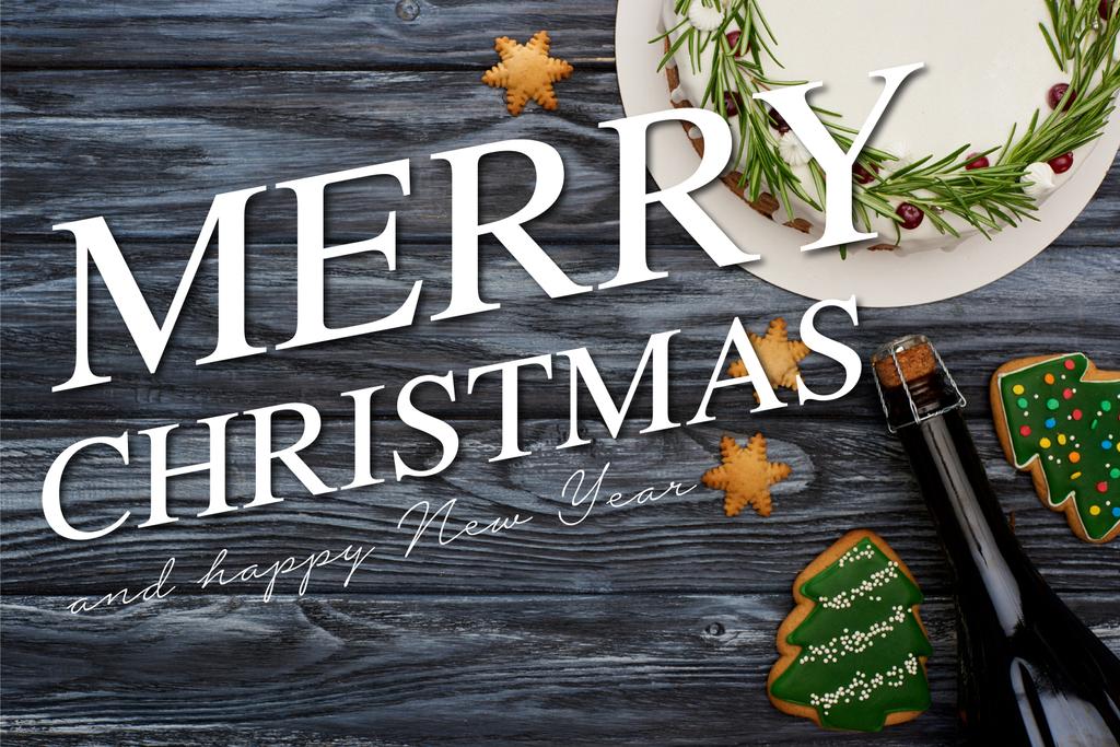 vue du dessus de tarte de Noël, bouteille de champagne et biscuits sapin de Noël sur table en bois sombre avec Joyeux Noël et heureuse illustration de nouvelle année
 - Photo, image