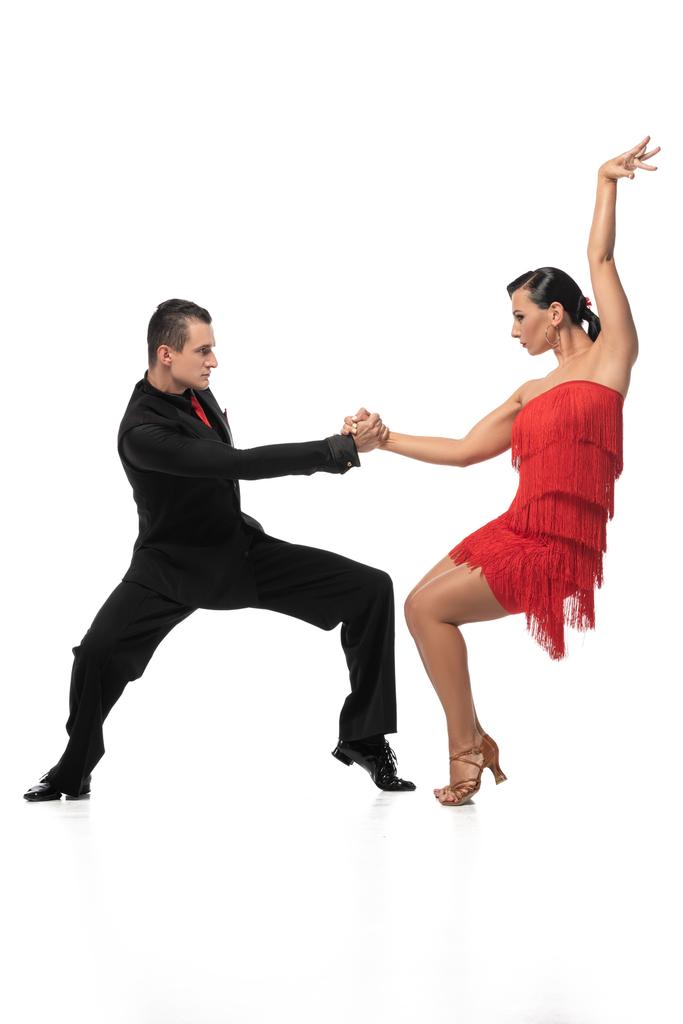 půvabné, elegantní tanečnice tango na bílém pozadí - Fotografie, Obrázek