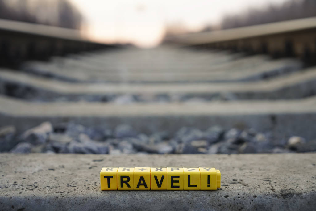 word travel . Railway with sun rays background - Photo, Image