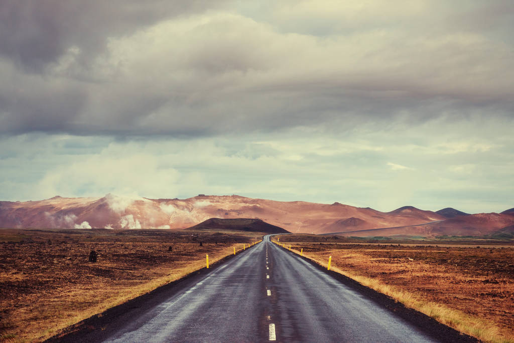 Asphalt road to the mountains Iceland. Beauty world - Photo, Image