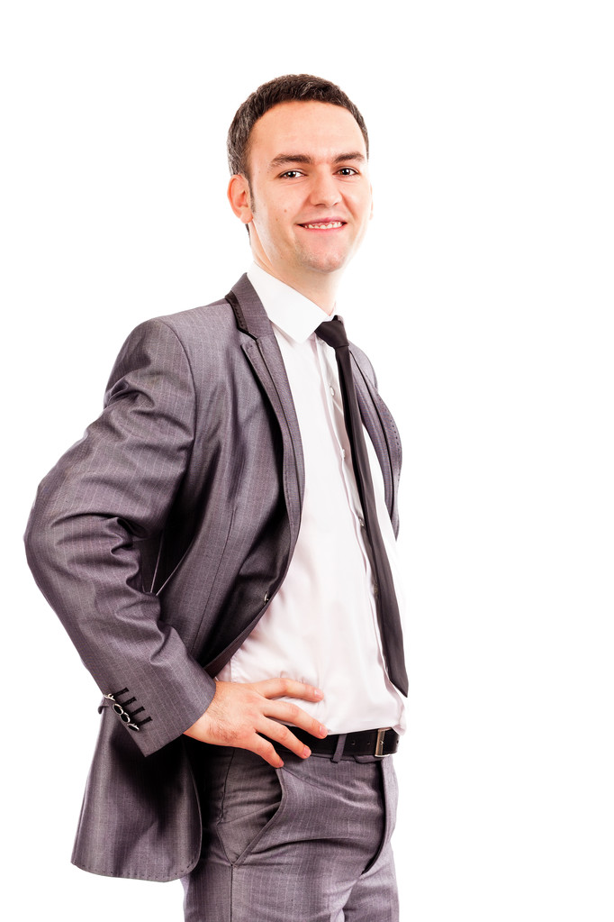 uśmiechnięty mężczyzna młody biznes z rękami na biodrach - Zdjęcie, obraz