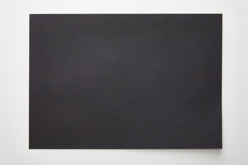 top view of empty black paper on white background - Photo, Image