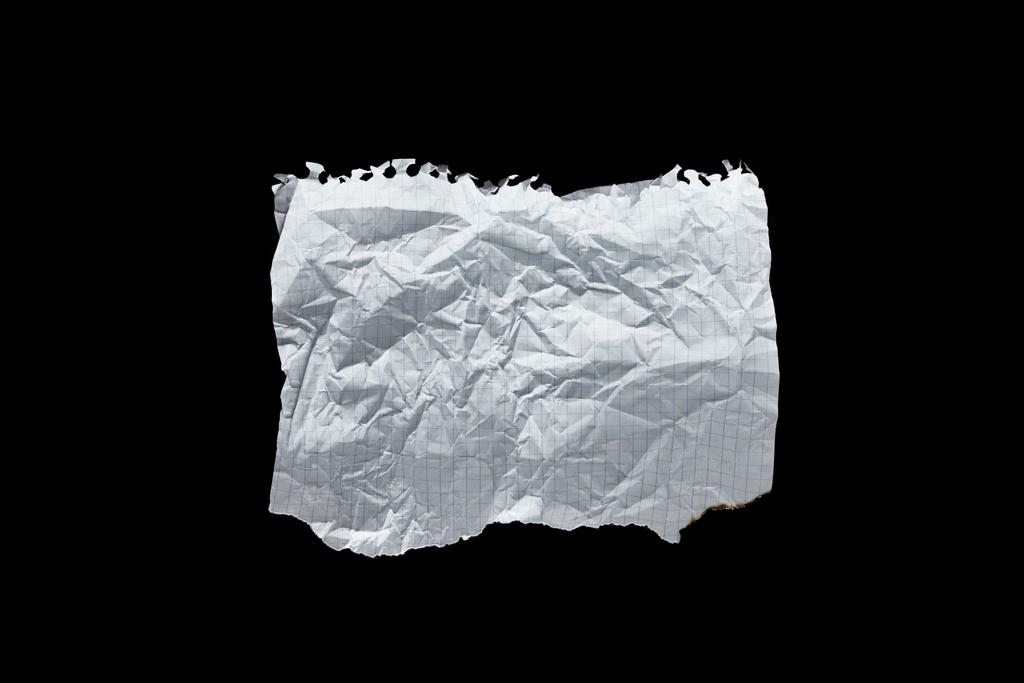 bovenaanzicht van leeg wit verfrommeld papier geïsoleerd op zwart - Foto, afbeelding