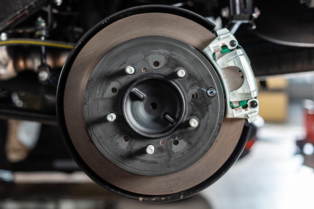 close up view of assembled disk brakes with brake caliper  - Photo, Image