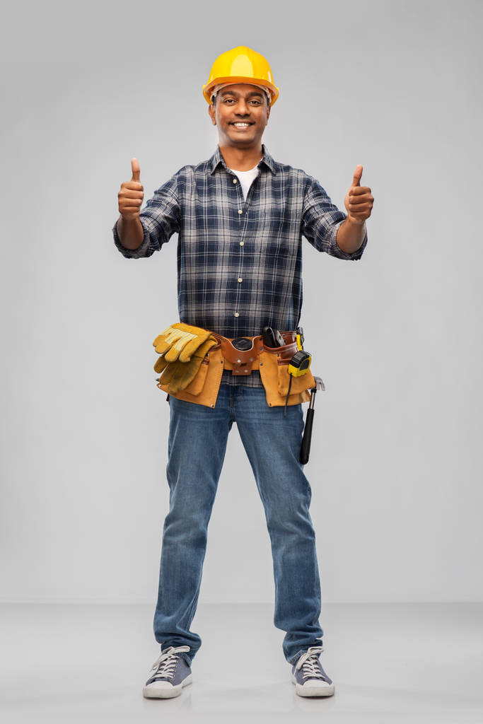 щасливий індійський працівник або будівельник, показуючи великі пальці вгору
 - Фото, зображення