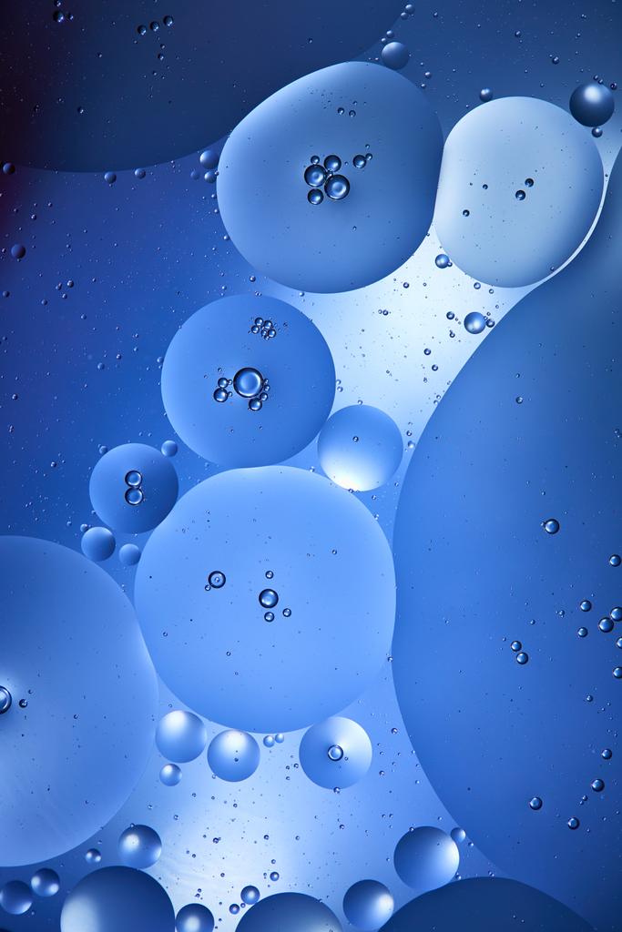 Beautiful abstract background from mixed water and oil in blue color - Photo, Image