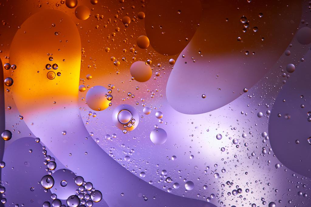 texture abstraite de couleur pourpre et orange des bulles d'eau et d'huile mélangées
 - Photo, image