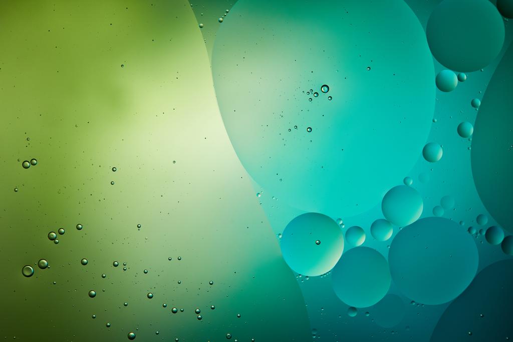 fond abstrait de bulles d'eau et d'huile mélangées de couleur verte et turquoise
 - Photo, image