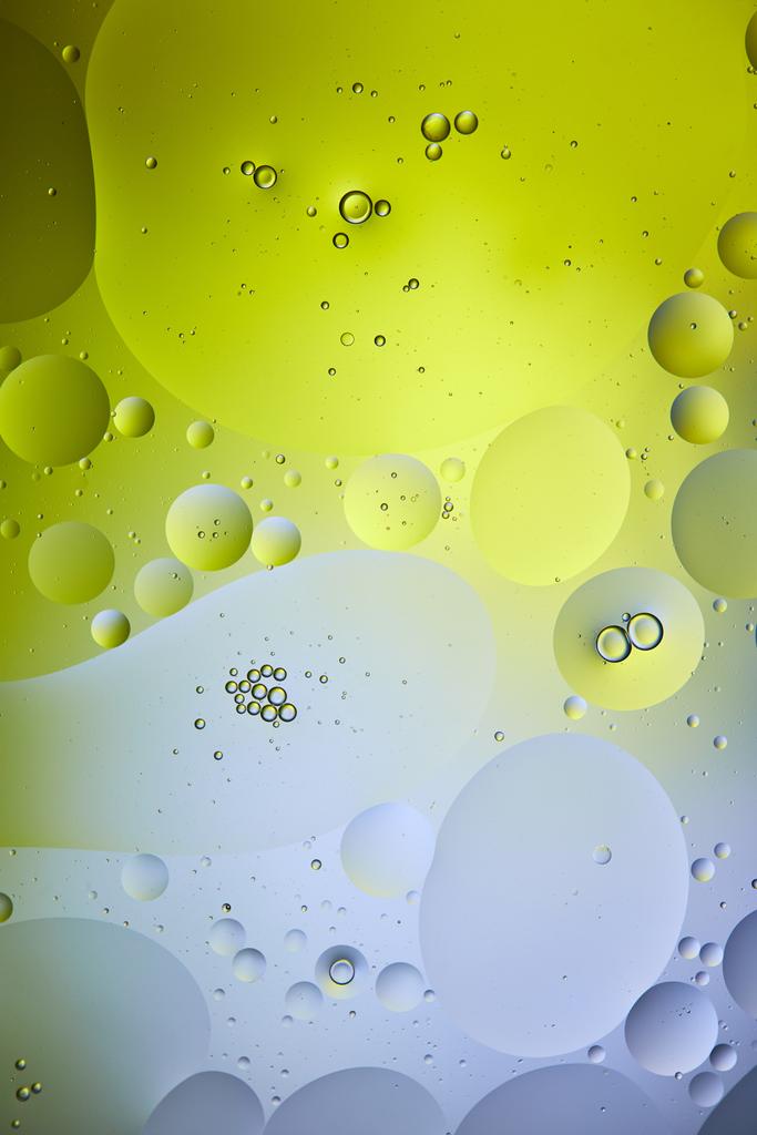абстрактний фон із змішаної води та масляних бульбашок зеленого та сірого кольорів
 - Фото, зображення