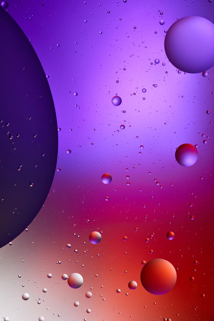 velkolepé abstraktní fialové a červené barvy textury ze smíšené vody a olejových bublin - Fotografie, Obrázek