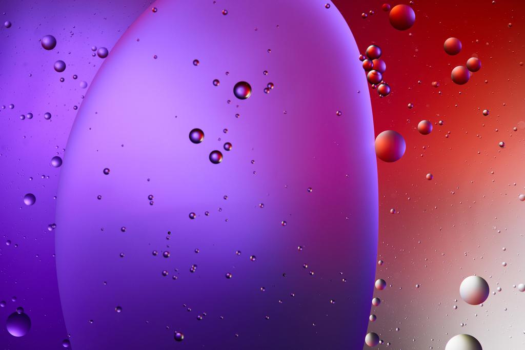 creative abstract purple and red color texture from mixed water and oil bubbles - Photo, Image