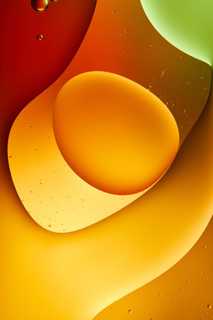 fondo abstracto de color naranja, rojo y verde del agua mezclada y el aceite
  - Foto, imagen
