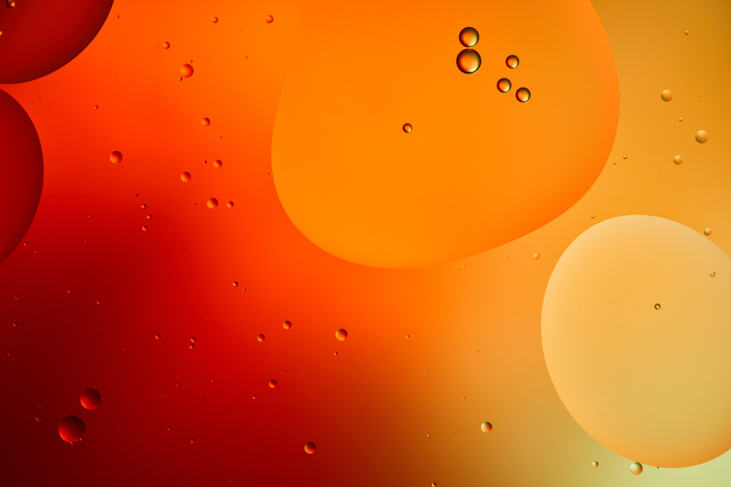 Beau fond abstrait de couleur orange et rouge de l'eau et de l'huile mélangées
  - Photo, image